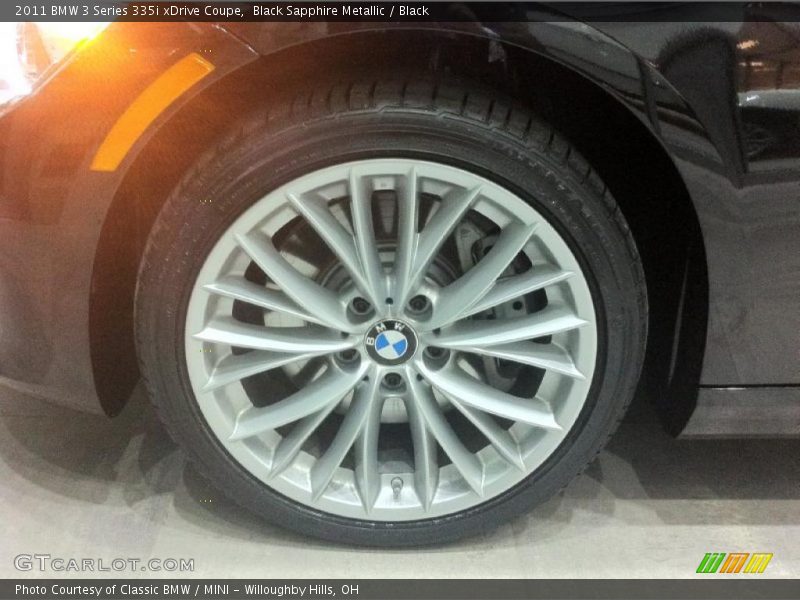 Black Sapphire Metallic / Black 2011 BMW 3 Series 335i xDrive Coupe