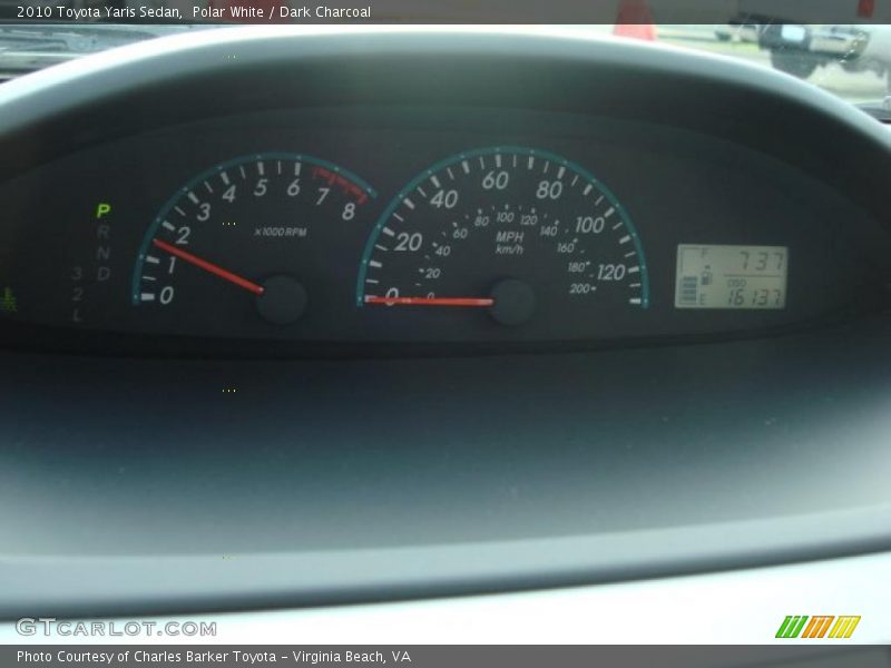 Polar White / Dark Charcoal 2010 Toyota Yaris Sedan