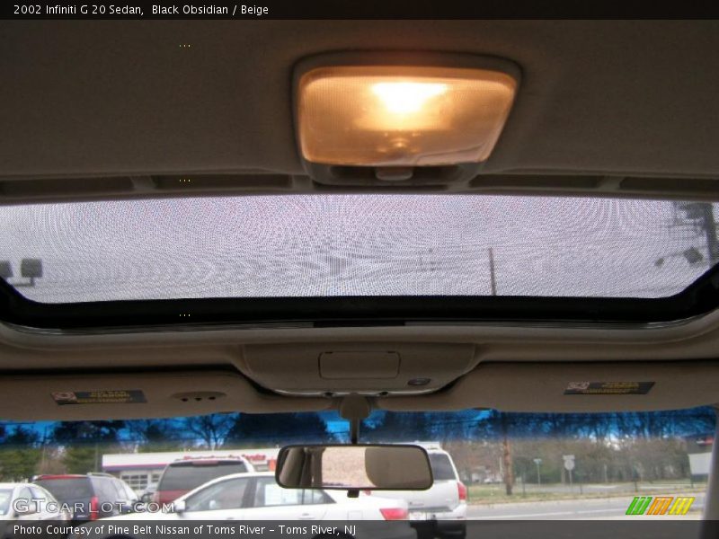 Black Obsidian / Beige 2002 Infiniti G 20 Sedan