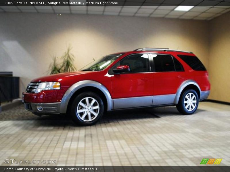 Sangria Red Metallic / Medium Light Stone 2009 Ford Taurus X SEL