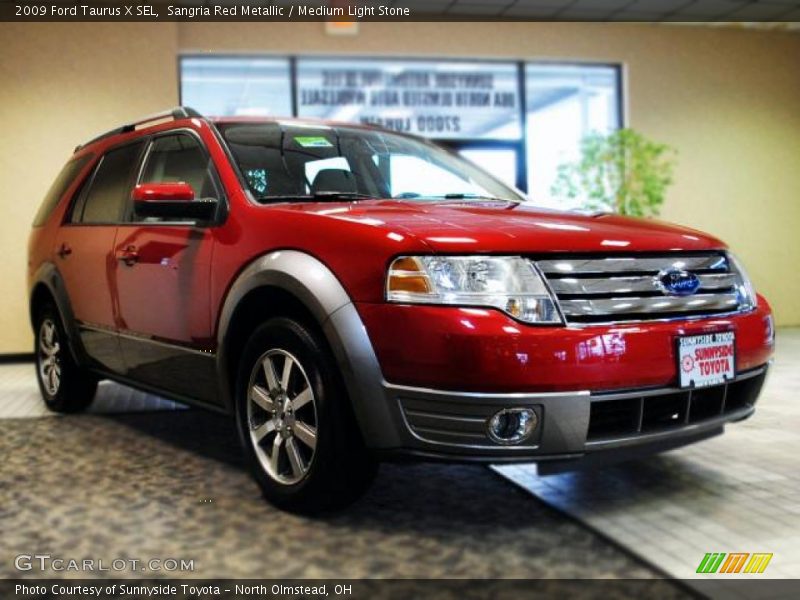 Sangria Red Metallic / Medium Light Stone 2009 Ford Taurus X SEL