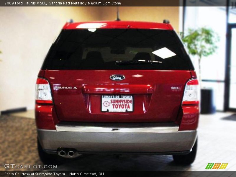 Sangria Red Metallic / Medium Light Stone 2009 Ford Taurus X SEL