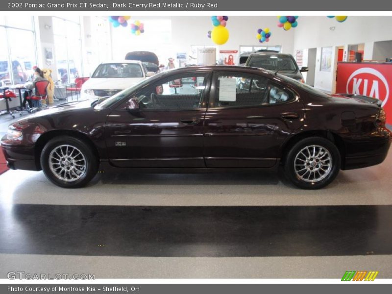 Dark Cherry Red Metallic / Ruby Red 2002 Pontiac Grand Prix GT Sedan