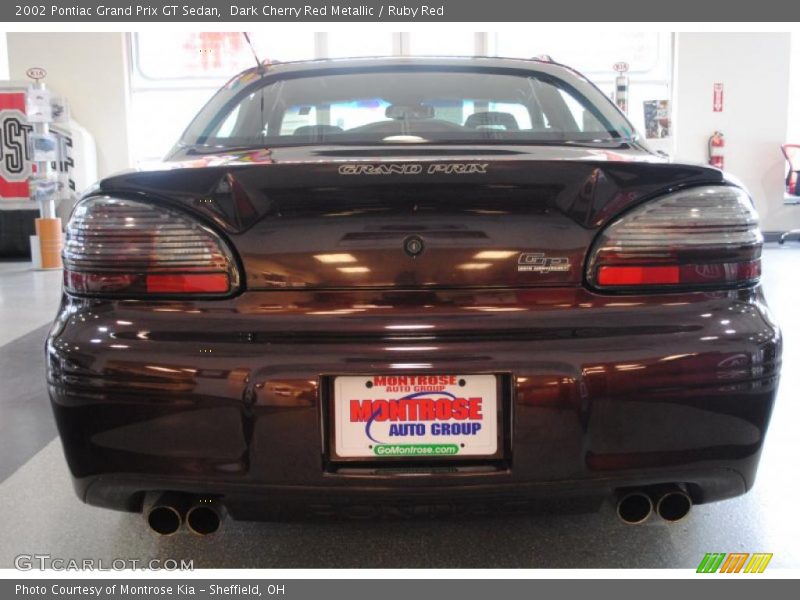 Dark Cherry Red Metallic / Ruby Red 2002 Pontiac Grand Prix GT Sedan