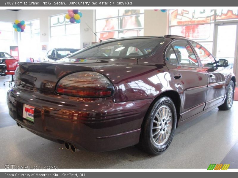Dark Cherry Red Metallic / Ruby Red 2002 Pontiac Grand Prix GT Sedan