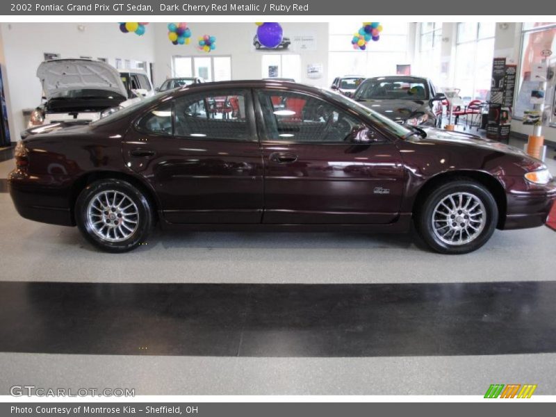 Dark Cherry Red Metallic / Ruby Red 2002 Pontiac Grand Prix GT Sedan