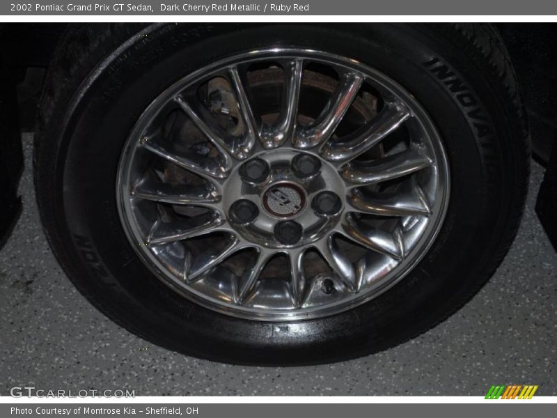 Dark Cherry Red Metallic / Ruby Red 2002 Pontiac Grand Prix GT Sedan