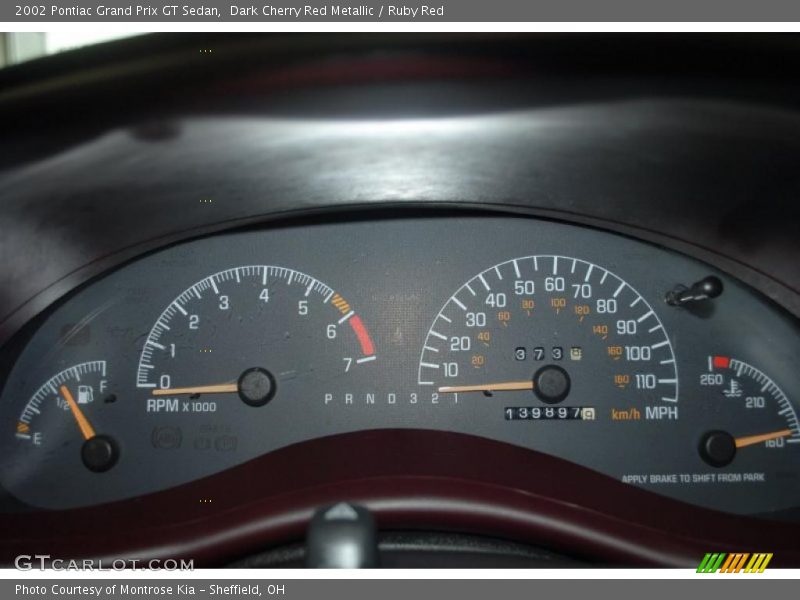 Dark Cherry Red Metallic / Ruby Red 2002 Pontiac Grand Prix GT Sedan