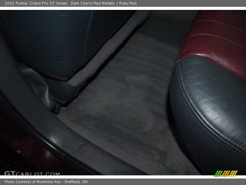 Dark Cherry Red Metallic / Ruby Red 2002 Pontiac Grand Prix GT Sedan