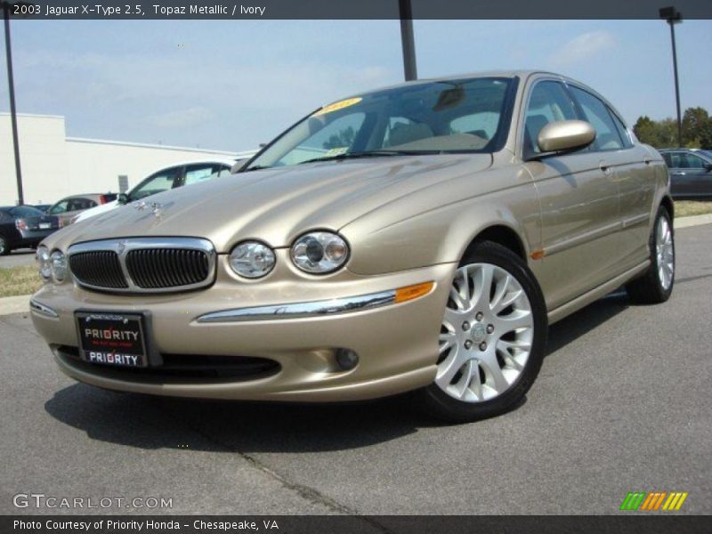 Topaz Metallic / Ivory 2003 Jaguar X-Type 2.5