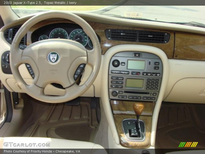 Topaz Metallic / Ivory 2003 Jaguar X-Type 2.5