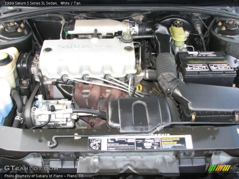 White / Tan 1999 Saturn S Series SL Sedan