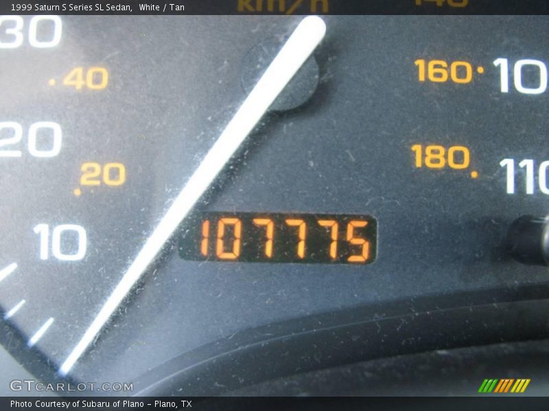 White / Tan 1999 Saturn S Series SL Sedan