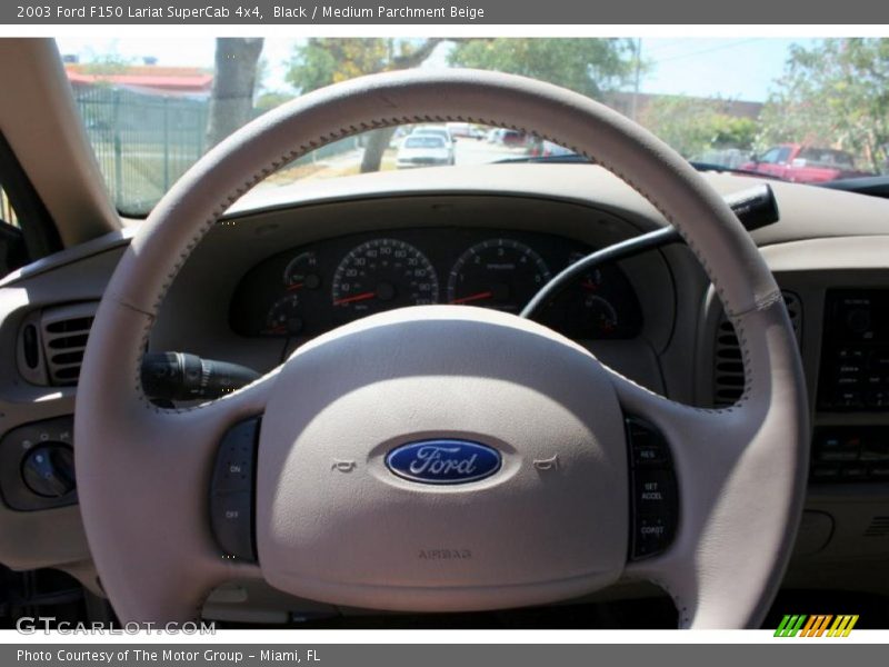 Black / Medium Parchment Beige 2003 Ford F150 Lariat SuperCab 4x4