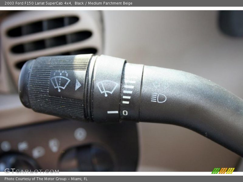 Black / Medium Parchment Beige 2003 Ford F150 Lariat SuperCab 4x4