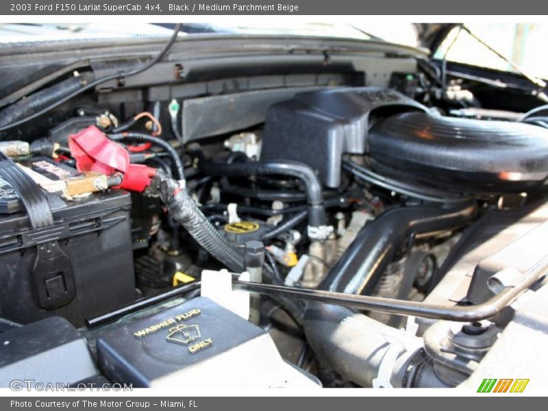 Black / Medium Parchment Beige 2003 Ford F150 Lariat SuperCab 4x4