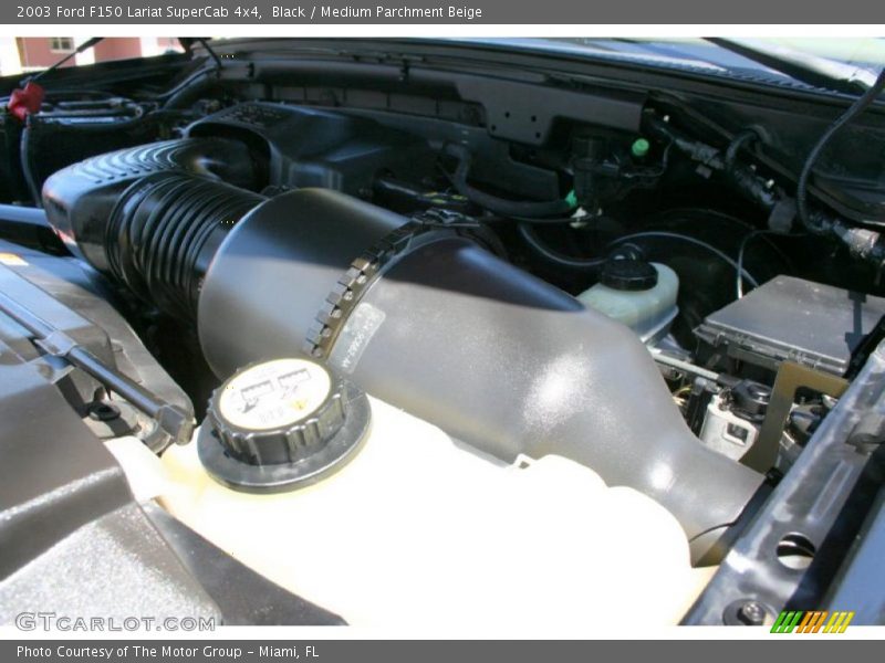 Black / Medium Parchment Beige 2003 Ford F150 Lariat SuperCab 4x4