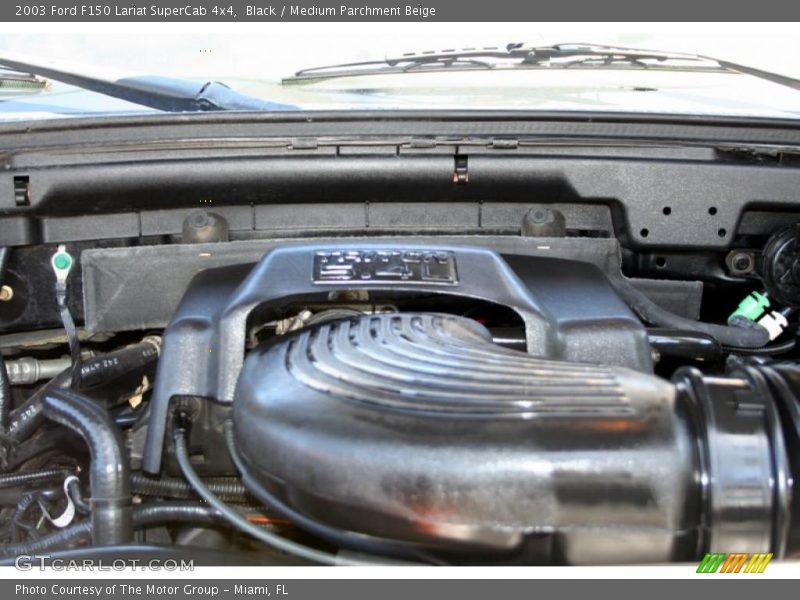 Black / Medium Parchment Beige 2003 Ford F150 Lariat SuperCab 4x4