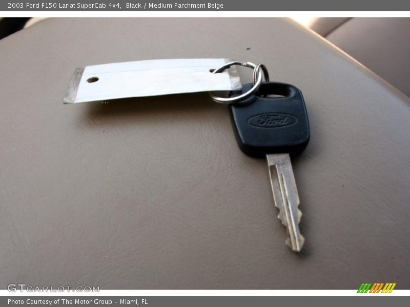 Black / Medium Parchment Beige 2003 Ford F150 Lariat SuperCab 4x4