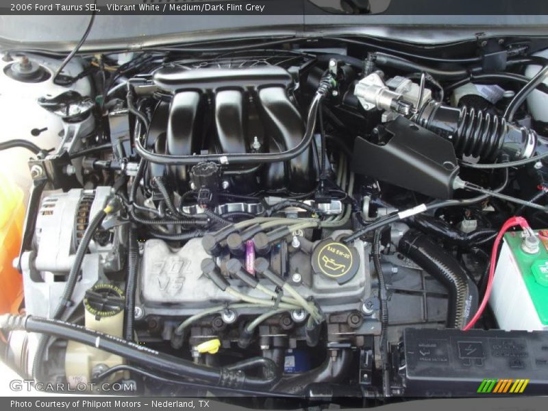 Vibrant White / Medium/Dark Flint Grey 2006 Ford Taurus SEL