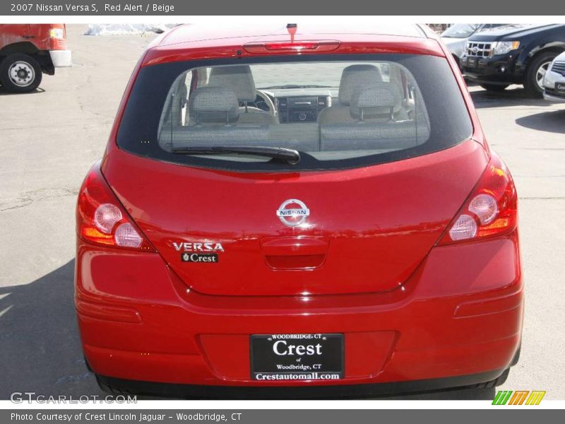 Red Alert / Beige 2007 Nissan Versa S