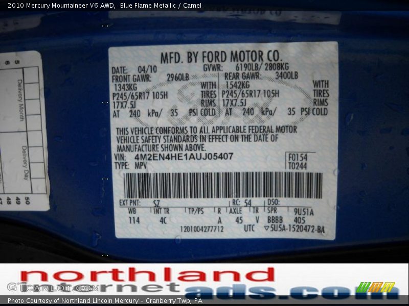 Blue Flame Metallic / Camel 2010 Mercury Mountaineer V6 AWD
