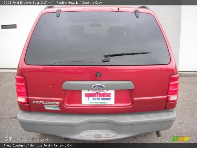 Redfire Metallic / Graphite Grey 2003 Ford Explorer Sport XLT 4x4