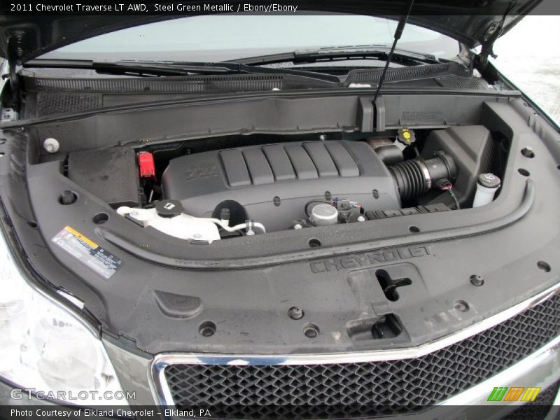 Steel Green Metallic / Ebony/Ebony 2011 Chevrolet Traverse LT AWD