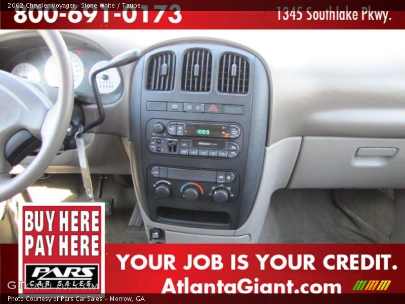 Stone White / Taupe 2002 Chrysler Voyager
