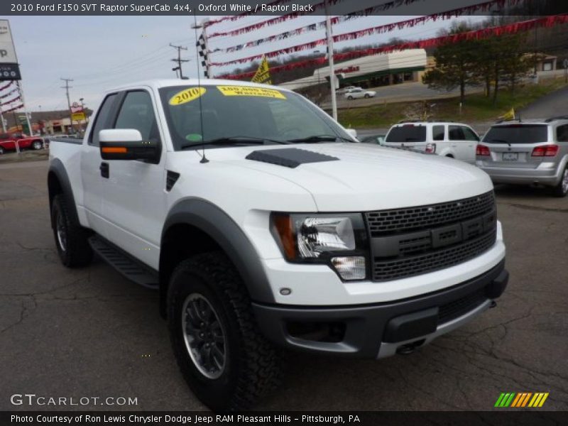 Front 3/4 View of 2010 F150 SVT Raptor SuperCab 4x4