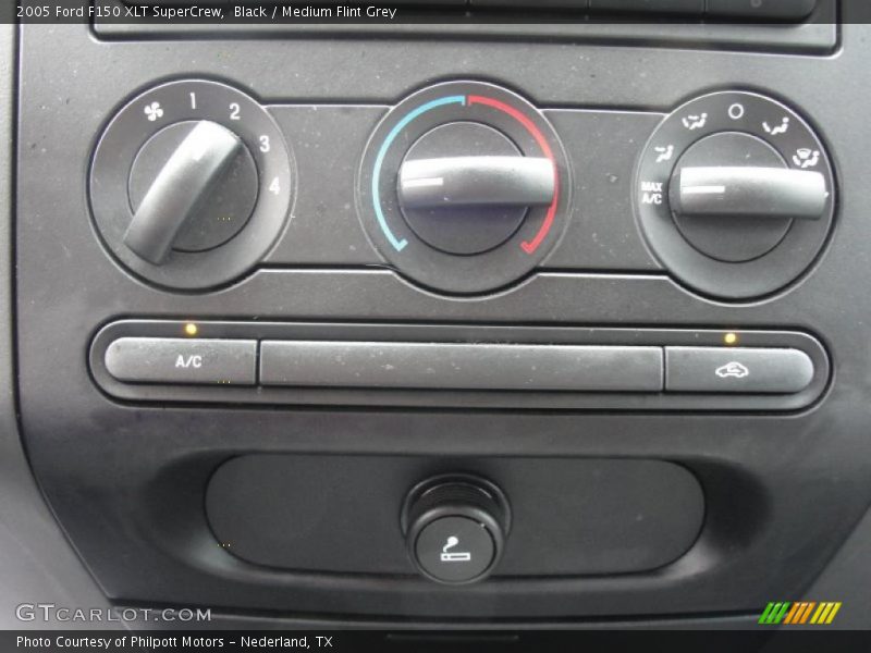 Black / Medium Flint Grey 2005 Ford F150 XLT SuperCrew