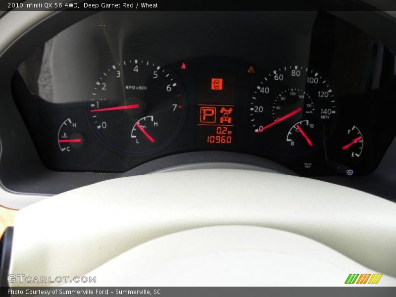 Deep Garnet Red / Wheat 2010 Infiniti QX 56 4WD