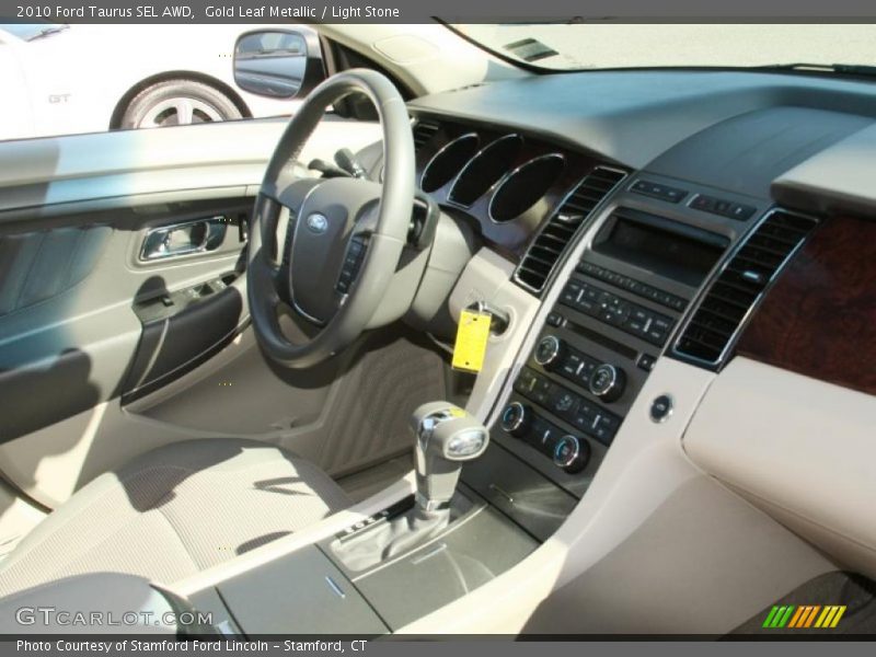 Gold Leaf Metallic / Light Stone 2010 Ford Taurus SEL AWD