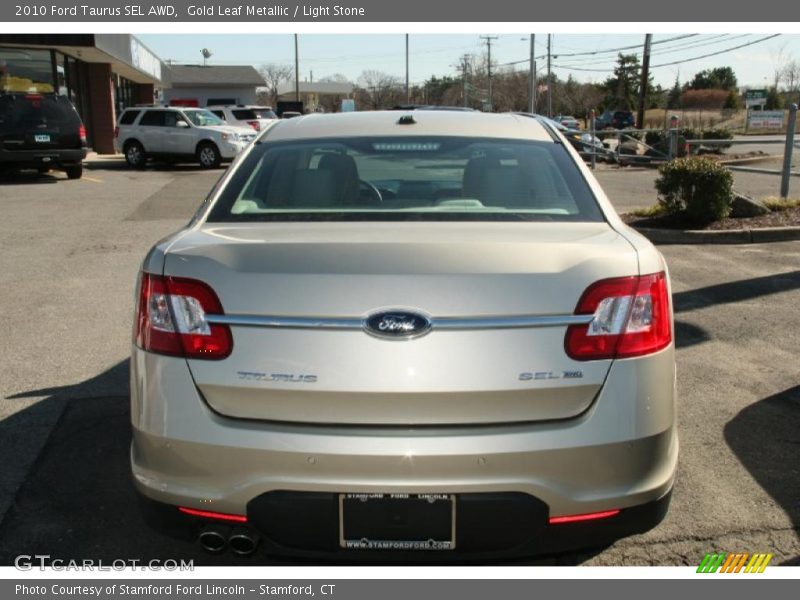 Gold Leaf Metallic / Light Stone 2010 Ford Taurus SEL AWD
