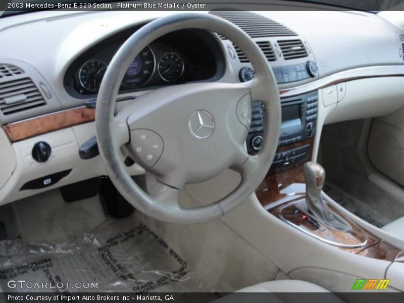 Platinum Blue Metallic / Oyster 2003 Mercedes-Benz E 320 Sedan