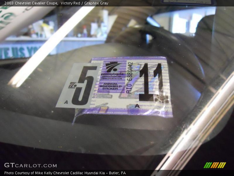 Victory Red / Graphite Gray 2003 Chevrolet Cavalier Coupe