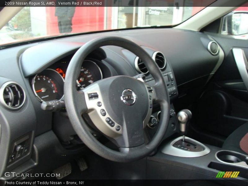 Venom Red / Black/Red 2009 Nissan Rogue SL AWD