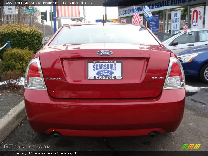 Redfire Metallic / Charcoal Black 2009 Ford Fusion SE V6