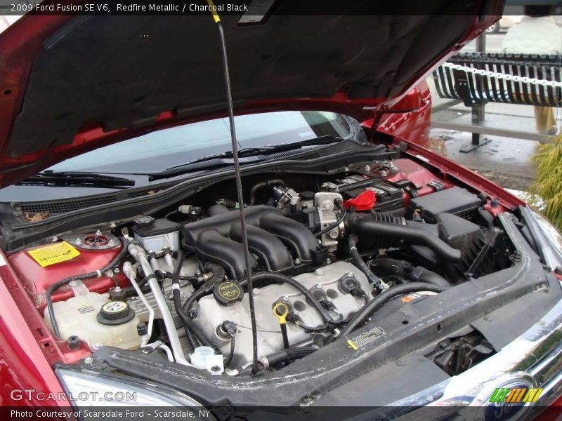 Redfire Metallic / Charcoal Black 2009 Ford Fusion SE V6
