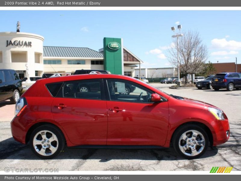 Red Hot Metallic / Ebony 2009 Pontiac Vibe 2.4 AWD