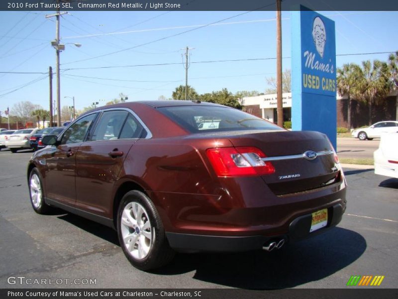 Cinnamon Red Metallic / Light Stone 2010 Ford Taurus SEL