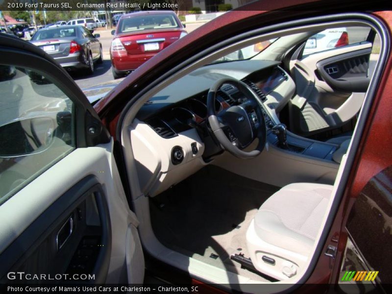 Cinnamon Red Metallic / Light Stone 2010 Ford Taurus SEL