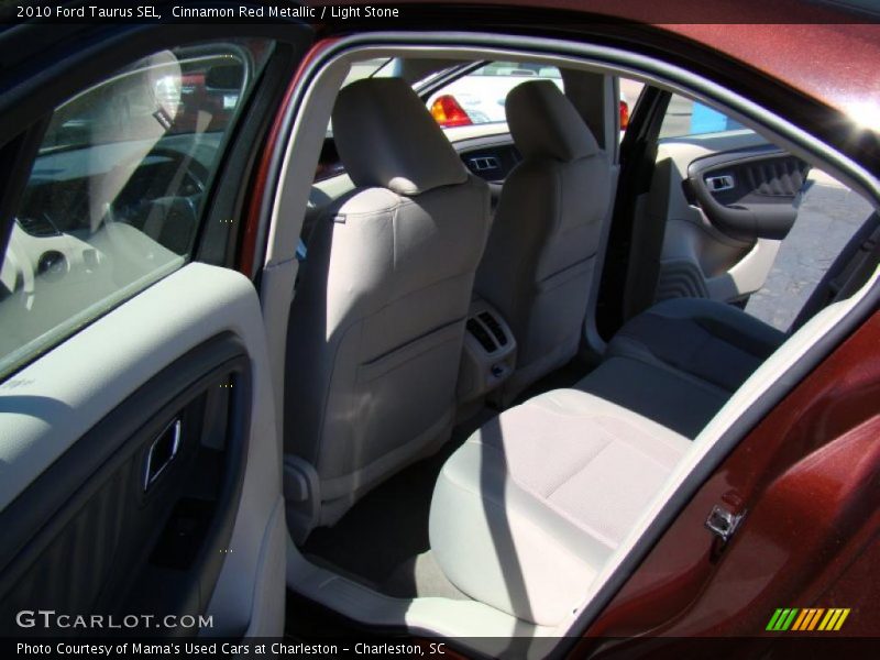 Cinnamon Red Metallic / Light Stone 2010 Ford Taurus SEL