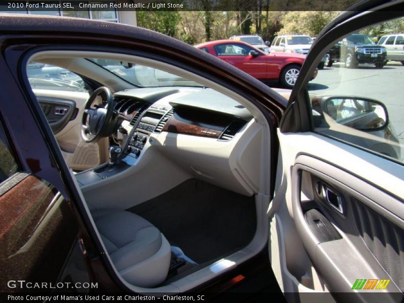 Cinnamon Red Metallic / Light Stone 2010 Ford Taurus SEL