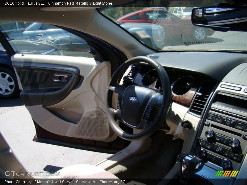 Cinnamon Red Metallic / Light Stone 2010 Ford Taurus SEL