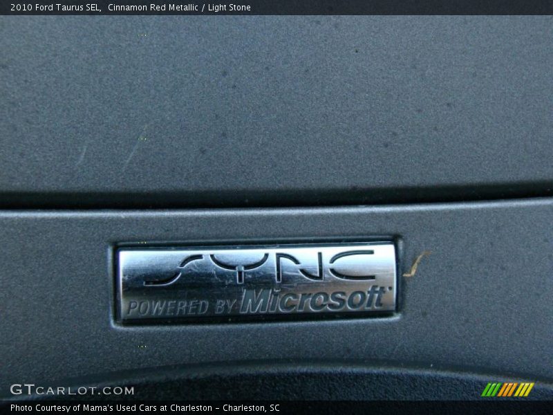Cinnamon Red Metallic / Light Stone 2010 Ford Taurus SEL