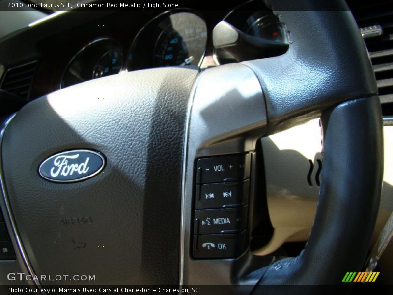 Cinnamon Red Metallic / Light Stone 2010 Ford Taurus SEL