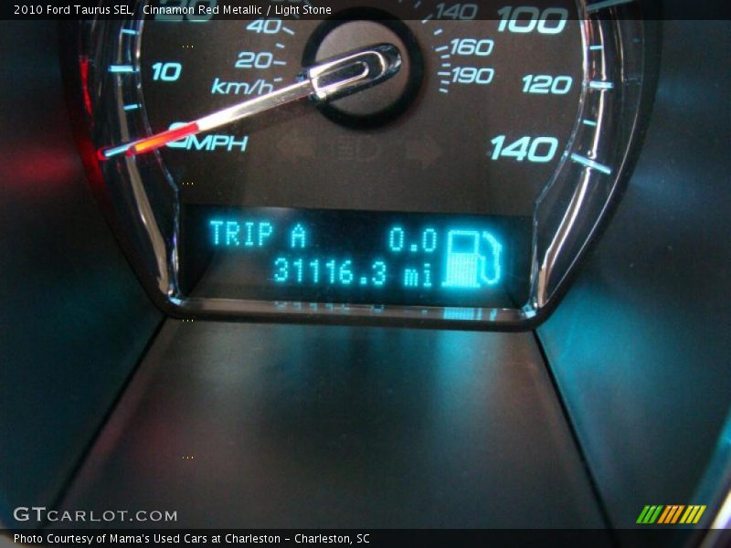 Cinnamon Red Metallic / Light Stone 2010 Ford Taurus SEL