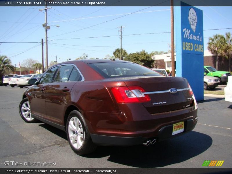 Cinnamon Red Metallic / Light Stone 2010 Ford Taurus SEL