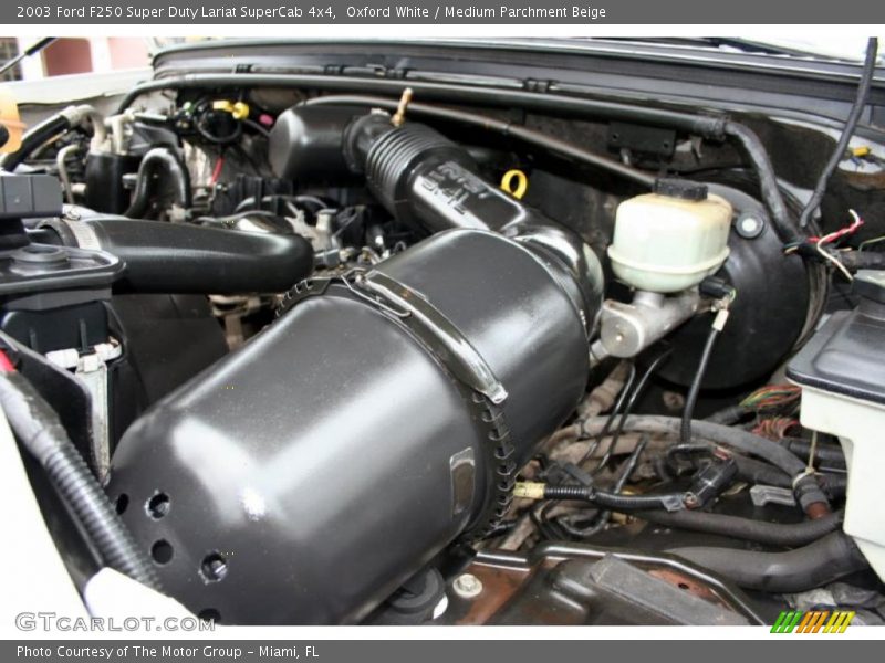 Oxford White / Medium Parchment Beige 2003 Ford F250 Super Duty Lariat SuperCab 4x4